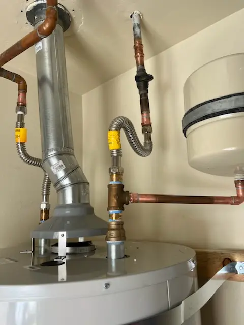 Water heater installation and plumbing repair in Woodland Way